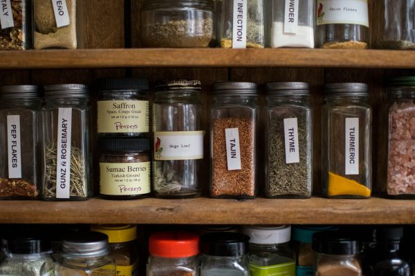 What are the best tips for organizing a spice drawer to maximize accessibility and freshness?